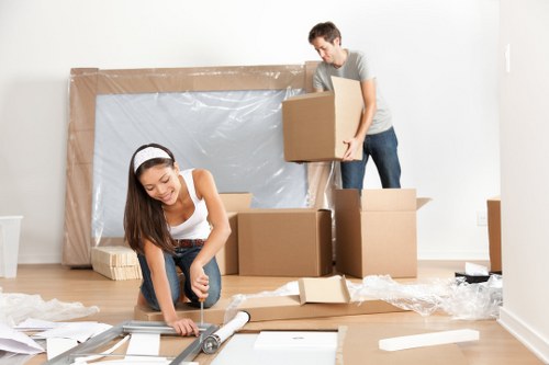 Office relocation planning in Islington with moving checklist and boxes