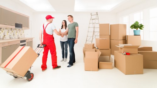 Organised office furniture and boxes ready for relocation in Islington